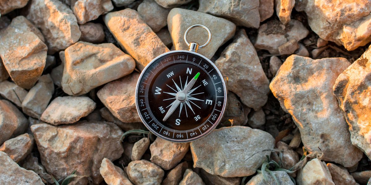 Compass on rocks